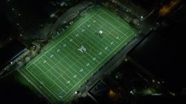 5.5K aerial stock footage approaching football practice at Portland State University sports field at night, Downtown Portland, Oregon Aerial Stock Footage | AX155_435E