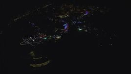 5.5K aerial stock footage approaching and fly over the Oregon Zoo with holiday lights at night, Southwest Portland, Oregon Aerial Stock Footage | AX155_439
