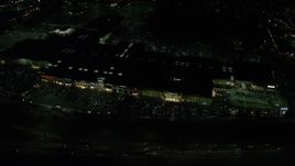 5.5K aerial stock footage orbiting the Washington Square shopping mall at night in Tigard, Oregon Aerial Stock Footage | AX155_451E
