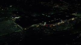 5.5K aerial stock footage orbiting the side of Washington Square mall at nighttime in Tigard, Oregon Aerial Stock Footage | AX155_456E