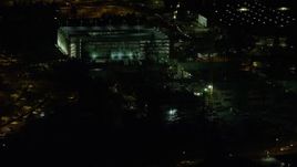 5.5K aerial stock footage flying by a six-story parking garage at night, Beaverton, Oregon Aerial Stock Footage | AX155_468E