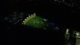 5.5K aerial stock footage orbiting Topgolf course in Hillsboro, Oregon at night Aerial Stock Footage | AX155_479E
