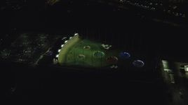 5.5K aerial stock footage orbiting the Topgolf course in Hillsboro, Oregon at night Aerial Stock Footage | AX155_480
