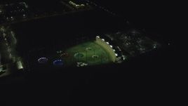 5.5K aerial stock footage orbiting around the Topgolf course in Hillsboro, Oregon at night Aerial Stock Footage | AX155_482