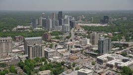 4.8K aerial stock footage tilt from Peachtree Road to reveal high-rises and skyscrapers, Buckhead, Georgia Aerial Stock Footage | AX36_054E