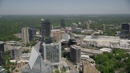 4.8K aerial stock footage flying by skyscrapers and office buildings toward a shopping center, Buckhead, Georgia Aerial Stock Footage | AX36_068E