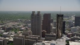 4.8K aerial stock footage flying by SunTrust Plaza reavealing skyscrapers and hotel, Downtown Atlanta Aerial Stock Footage | AX36_093E