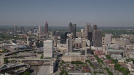 4.8K aerial stock footage approaching Downtown skyscrapers with Midtown Atlanta in the distance, Georgia Aerial Stock Footage | AX37_011E