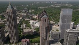 4.8K aerial stock footage flying over GLG Grand and tilt to bird's eye view of Promenade II, Midtown Atlanta, Georgia Aerial Stock Footage | AX37_018E