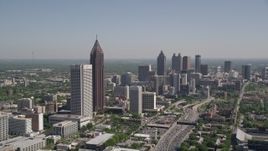 4.8K aerial stock footage flying by Midtown Atlanta skyscrapers toward Downtown skyscrapers, Georgia Aerial Stock Footage | AX37_042