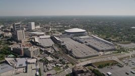 4.8K aerial stock footage tilt from elementary school in residential neighborhood, reveal Georgia Dome, Atlanta Aerial Stock Footage | AX37_075E