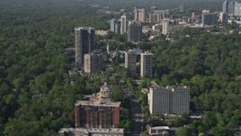 4.8K aerial stock footage following Peachtree Road through condominium complexes and trees, Buckhead, Georgia Aerial Stock Footage | AX38_009