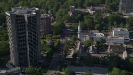 4.8K aerial stock footage approaching a church near condominium complexes, Buckhead, Georgia Aerial Stock Footage | AX38_010E