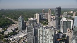 4.8K aerial stock footage approaching skyscrapers and tilting down on an office building, Buckhead, Georgia Aerial Stock Footage | AX38_021
