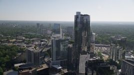 4.8K aerial stock footage flying by 3344 Peachtree skyscraper and approach Terminus Atlanta, Buckhead, Georgia Aerial Stock Footage | AX38_026
