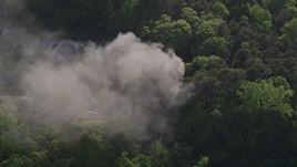 4.8K aerial stock footage orbiting smoke from a burning home, West Atlanta, Georgia Aerial Stock Footage | AX38_038E