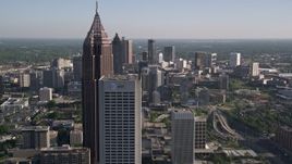 4.8K aerial stock footage approach and pass Bank of America Plaza and Midtown skyscrapers revealing Downtown skyscrapers, Atlanta Aerial Stock Footage | AX38_069E