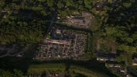 4.8K aerial stock footage tilting down on a junkyard, West Atlanta, Georgia Aerial Stock Footage | AX39_001