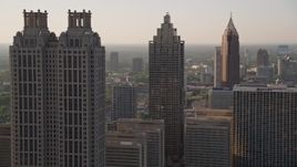 4.8K aerial stock footage flying by sksycrapers revealing a row of sksycrapers, Downtown Atlanta, Georgia Aerial Stock Footage | AX39_018