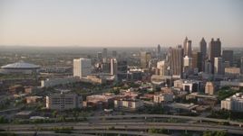 4.8K aerial stock footage tilting up from city streets to reveal Downtown Atlanta; Georgia Aerial Stock Footage | AX39_043