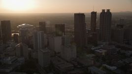 4.8K aerial stock footage panning across Downtown Atlanta skyscrapers, Georgia, sunset Aerial Stock Footage | AX39_066