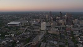 4.8K aerial stock footage of Midtown and Georgia Dome seen while approaching Downtown, Atlanta, Georgia, twilight Aerial Stock Footage | AX40_002E