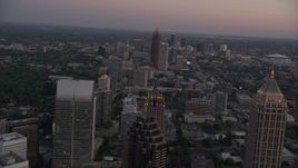 4.8K aerial stock footage flying over skyscrapers and office buildings, Midtown Atlanta, Georgia, twilight Aerial Stock Footage | AX40_009E