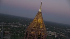 4.8K aerial stock footage close-up of the top of Bank of America Plaza, Midtown Atlanta, twilight Aerial Stock Footage | AX40_011