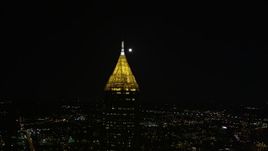 4.8K aerial stock footage orbiting Bank of America Plaza revealing moon over Midtown Atlanta, night Aerial Stock Footage | AX41_025E