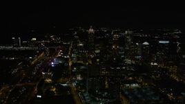 4.8K aerial stock footage tilting down on condominium complex, Midtown Atlanta, Georgia, night Aerial Stock Footage | AX41_027