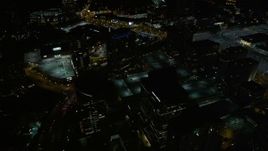 4.8K aerial stock footage tilting down on city parking lots, Buckhead, Georgia, night Aerial Stock Footage | AX41_049
