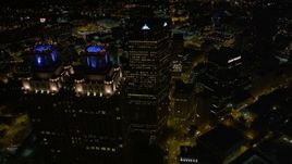 4.8K aerial stock footage flying over and between skyscrapers revealing State Capitol, Downtown Atlanta, Georgia, night Aerial Stock Footage | AX41_060E