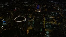 4.8K aerial stock footage approaching skyscrapers, tilt to bird's eye of 191 Peachtree, Downtown Atlanta, Georgia, night Aerial Stock Footage | AX41_065E