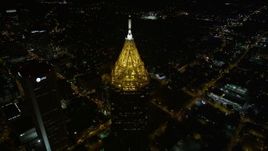 4.8K aerial stock footage tilting from black sky to reveal Bank of America Plaza, Midtown Atlanta, night Aerial Stock Footage | AX41_068E