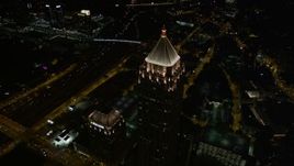 4.8K aerial stock footage approaching One Atlantic Center, tilt to bird's eye view, Midtown Atlanta, Georgia, night Aerial Stock Footage | AX41_070E