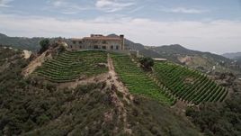 5K aerial stock footage of the scenic Malibu Rocky Oaks Estate Vineyards and hillside grapevines, Malibu, California Aerial Stock Footage | AX42_109