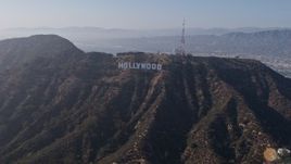 4K aerial stock footage orbiting the hills to reveal the Hollywood Sign, Los Angeles, California Aerial Stock Footage | AX43_007