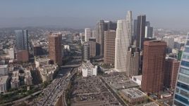 4K aerial stock footage flying by Ritz-Carlton toward I-110 and Downtown skyscrapers, Los Angeles, California Aerial Stock Footage | AX43_022E