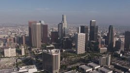 4K aerial stock footage flying by a group of skyscrapers in Downtown Los Angeles, California Aerial Stock Footage | AX43_032