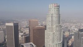4K aerial stock footage flying between City National Plaza and Aon Center to approach US Bank Tower, Downtown Los Angeles, California Aerial Stock Footage | AX43_037