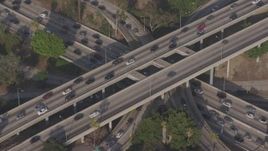 4K aerial stock footage approaching heavy rush hour traffic on the I-110 / 101 interchange, Downtown Los Angeles, California Aerial Stock Footage | AX43_040