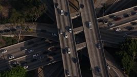 4K aerial stock footage approaching heavy rush hour traffic on the I-110 / 101 interchange, Downtown Los Angeles, California Aerial Stock Footage | AX43_040E