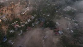 4K aerial stock footage flying over homes with a marine layer, Studio City, California Aerial Stock Footage | AX44_007