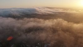 4K aerial stock footage of the marine layer over hills, Studio City, California, sunset Aerial Stock Footage | AX44_008E