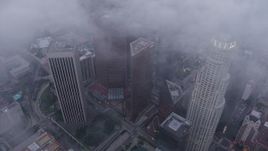 4K aerial stock footage circling above Downtown Los Angeles skyscrapers, California, twilight Aerial Stock Footage | AX44_039