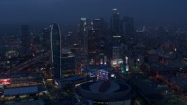 4K aerial stock footage approaching skyscrapers and high-rises, Downtown Los Angeles, twilight Aerial Stock Footage | AX44_063