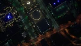 4K aerial stock footage of a bird's eye of city streets and buildings, Downtown Los Angeles, night Aerial Stock Footage | AX44_082