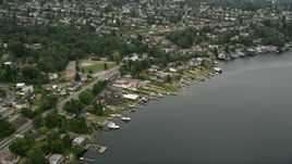 5K aerial stock footage flying by lakefront homes, Rainier Beach, Washington Aerial Stock Footage | AX45_001