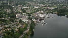 5K aerial stock footage approaching a small lakeshore marina and waterfront condo complexes, Rainier Beach, Washington Aerial Stock Footage | AX45_003