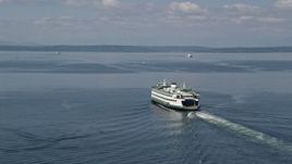 5K aerial stock footage tracking a ferry sailing Elliott Bay, Seattle Aerial Stock Footage | AX45_043E